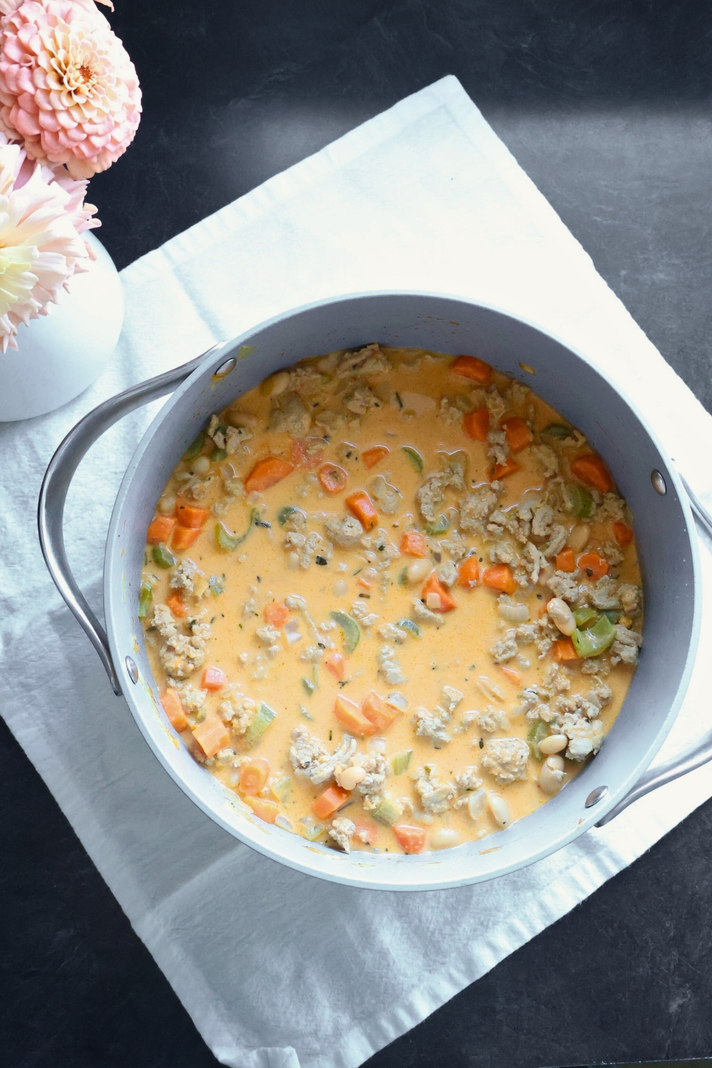 One-pot white bean pumpkin chili made with ground turkey, coconut milk, and carrots.