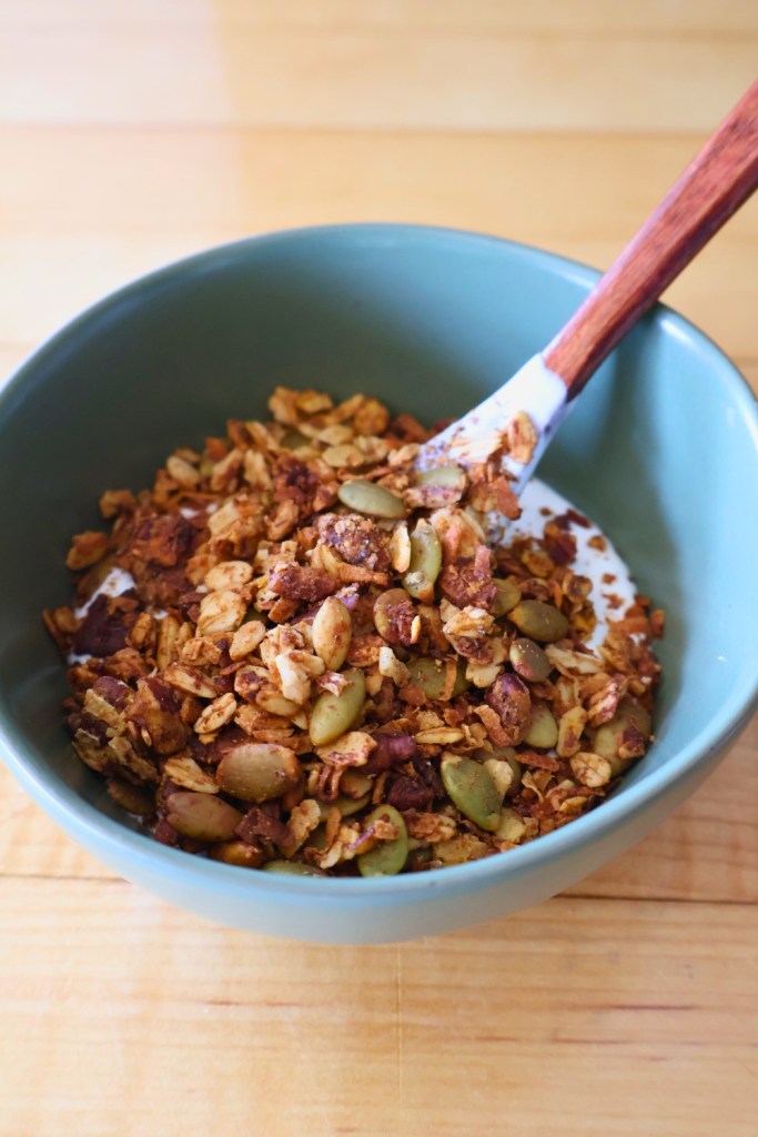 Healthy fall granola recipe made with oats, maple syrup, and pumpkin puree.